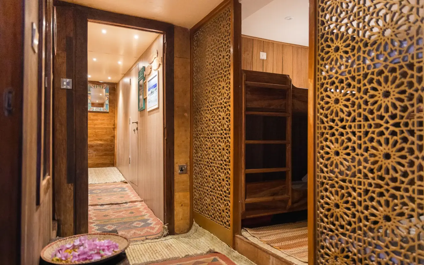 Luxury spa entrance with carved wooden screens and decorative basin, NaiSabah, Lamu Archipelago, Kenya