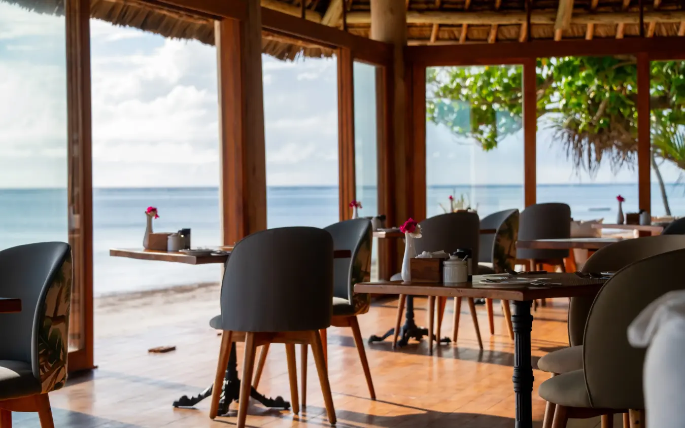 Beachfront dining pavilion with ocean views and tropical vegetation, Ocean Boutique Hotel, Zanzibar & Pemba, Tanzania