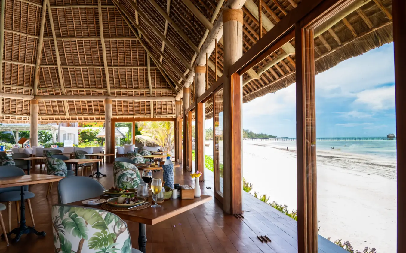 Beachfront pavilion with thatched roof overlooking white sand and turquoise waters, Ocean Boutique Hotel, Zanzibar & Pemba, Tanzania