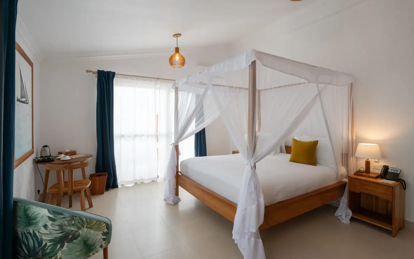 Luxury bedroom with four-poster canopy bed and ocean view, Ocean Boutique Hotel, Zanzibar & Pemba, Tanzania