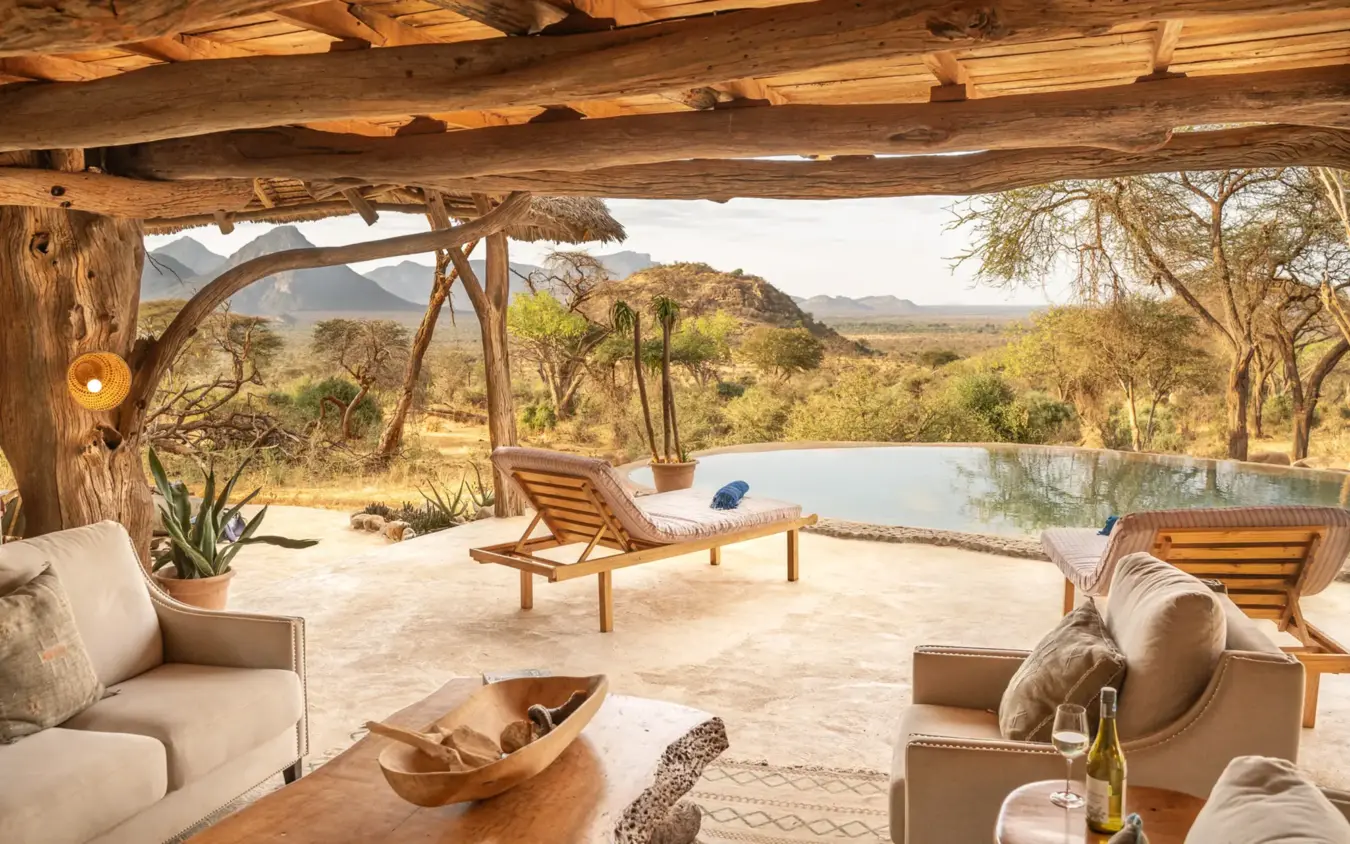 Luxury lounge pavilion with pool overlooking savanna landscape and mountains, Sarara Camp, Northern Kenya, Kenya