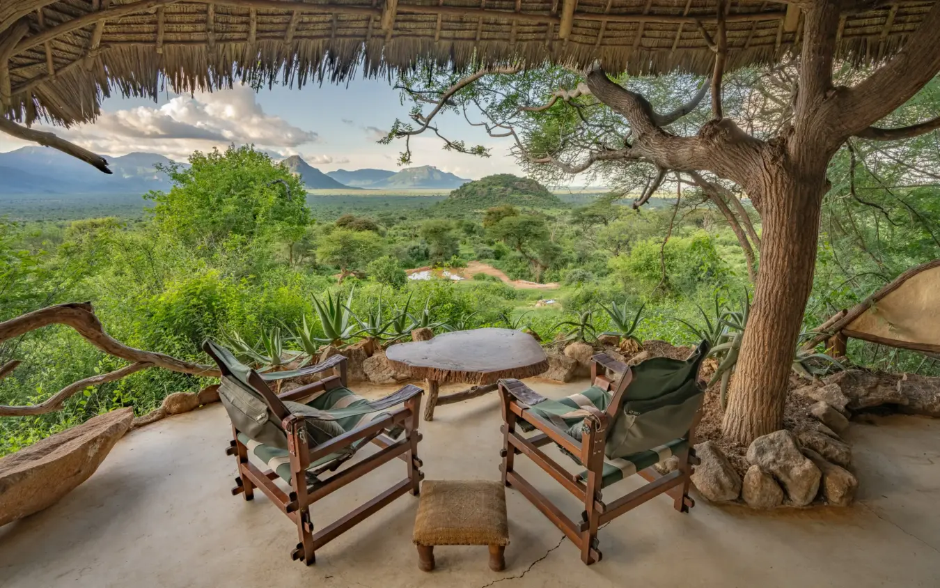 Shaded viewing platform with seating overlooking valley and distant mountain, Sarara Camp, Northern Kenya, Kenya