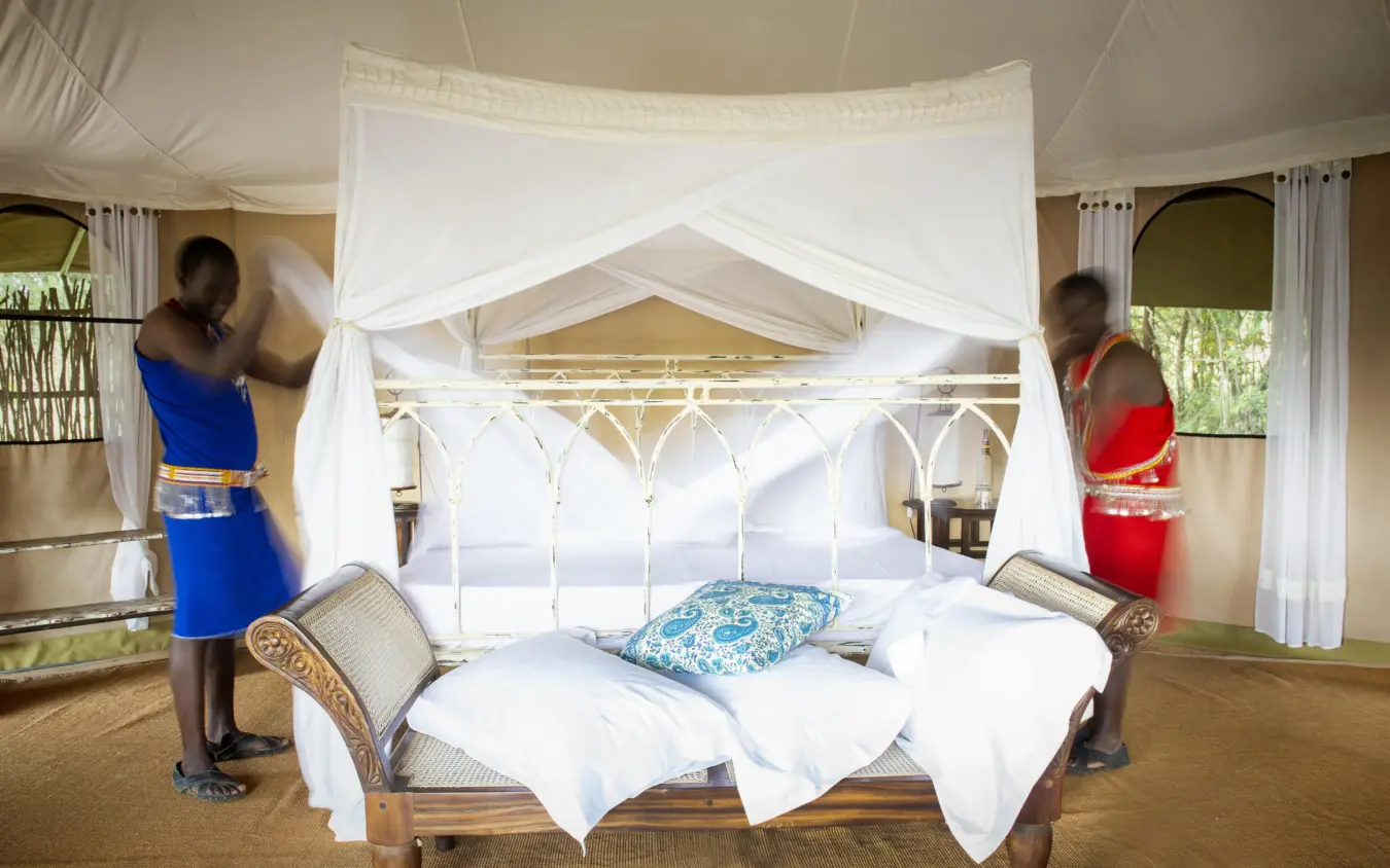 Luxury bedroom with white four-poster bed and draped canopy, Serian “The Original”, Maasai Mara, Kenya