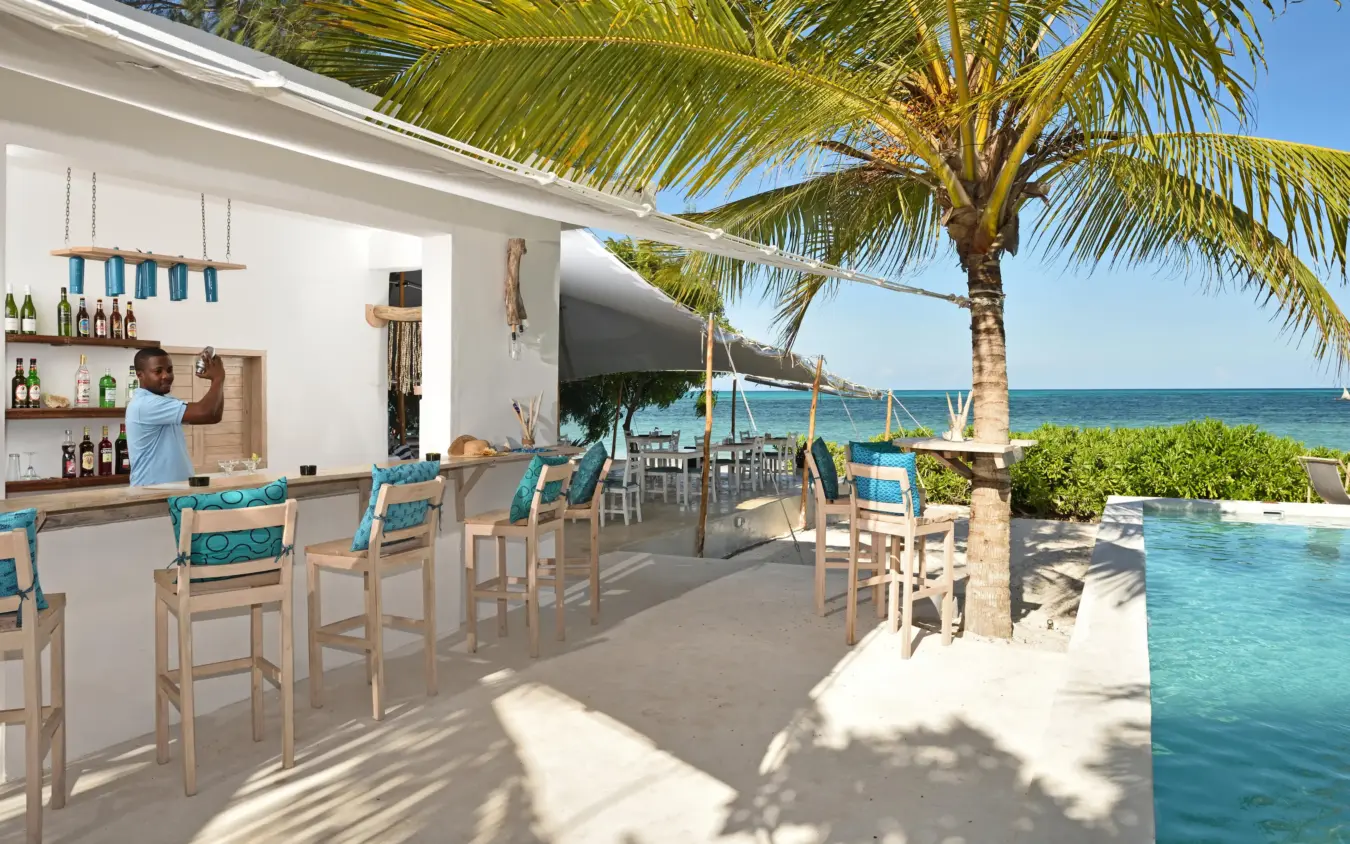 Beachfront bar and lounge overlooking turquoise ocean, Sharazad Boutique Hotel, Zanzibar & Pemba, Tanzania